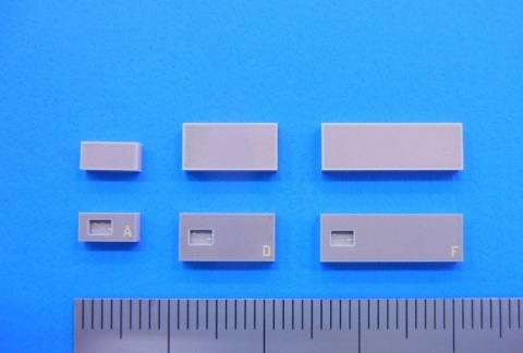 Ceramic packages with embedded RFID antenna (scale showing 1.0mm increments) (Photo: Business Wire)