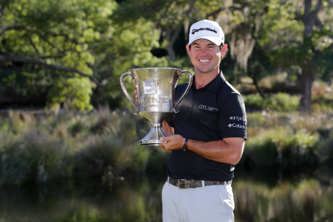 Brian Harman holding the trophy after a thrilling finish at the Wells Fargo Championship. Credit: Ge ... 