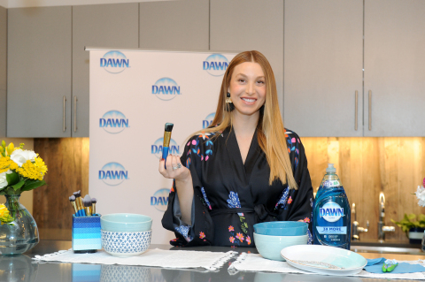 Whitney Port, lifestyle expert and mom-to-be, shares one of the many ways to use Dawn dish soap beyond the sink, including cleaning makeup brushes, Tuesday, May 9, 2017, at an event in New York. (Photo by Diane Bondareff/Invision for Dawn/AP Images)