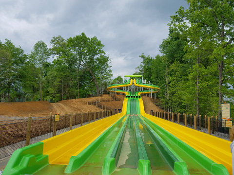 The newest attraction at Dollywood’s Splash Country is TailSpin Racer—a five-story family racing complex with slides that stretch longer than a football field! (Photo: Business Wire)