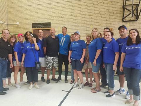 UnitedHealthcare volunteers on Thursday visited J.E. Clark Preparatory Academy in Detroit and painted a series of panel murals for the gym’s walls. At the school, the volunteers were joined by Detroit Lions wide receiver Marvin Jones Jr. and officials from City Year Detroit to announce UnitedHealthcare’s $11,000 donation to Jones’ Dreambuilders program. The donation was used to purchase four new basketball backboards and paint the gym’s lockers (Photo courtesy of UnitedHealthcare).