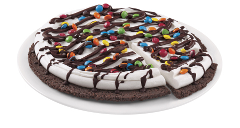 Fans can choose from Choco Brownie, Reese’s®, M&M® and Heath® Treatzza Pizzas. The crust is hand-made with a fudge cookie crunch that’s layered with DQ®’s signature vanilla soft serve, candy pieces and topped off with a chocolate drizzle. Just like a traditional pizza pie, Treatzza Pizzas are pre-cut to serve up to eight fans. (Photo: Business Wire) 
