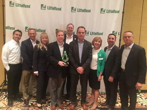 Littelfuse congratulates Arrow Electronics on winning the 2016 Volume Distributor of the Year award. Pictured (from left to right): Jason Lipps, Littelfuse distribution corporate account manager; John Drabik, Arrow VP & GM global PEMCO; Linda Rogers, Arrow corporate supplier manager; Alan Bird, Arrow president Americas; Dave Heinzmann, Littelfuse president and chief executive officer; Bruce Jones, Arrow VP PEMCO Americas; Dawn Manhart, Littelfuse director channel sales; Vince Pastor, Arrow director; passive business unit; Kent Smith, Arrow VP North American sales. (Photo: Business Wire)