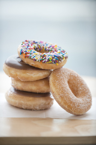 Krispy Kreme Doughnuts will offer each guest the doughnut of their choice on National Doughnut Day on June 2. (Photo: Business Wire)