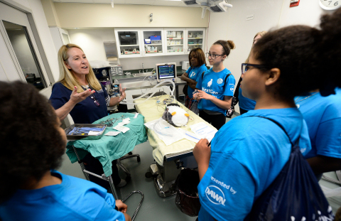 Shedd Aquarium veterinary technician Bernadette Maciol, left, gives Dawn's NextGen Animal Responders contest winners from Memorial Junior High School a behind-the-scenes tour of the Animal Hospital at Shedd Aquarium on Thursday, May 25, 2017 in Chicago. (Photo by Brian Kersey/Invision for Dawn/AP Images)