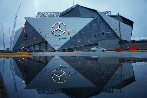 The iconic three-pointed star, measuring 66' wide, lights up for the first time during an inaugural lighting ceremony at Mercedes-Benz Stadium on Thursday, May 25, 2017 in Atlanta, GA. (Jason Hales/Mercedes-Benz)