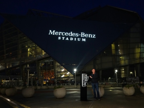 Mercedes-Benz Stadium roared to life this morning as MBUSA vice president of marketing, Drew Slaven ceremonially lit the three-pointed star and script on the Stadium in Atlanta. (Jason Hales/Mercedes-Benz)