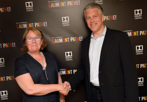 At the 2017 Cannes Film Festival, Martine Odillard, Chairman of Les Cinémas Gaumont Pathé and Doug Darrow, SVP, Cinema Business Group, Dolby Laboratories, commemorate Dolby and Pathé's collaboration to open 10 Dolby Cinema locations throughout France and the Netherlands. (Photo: Business Wire)