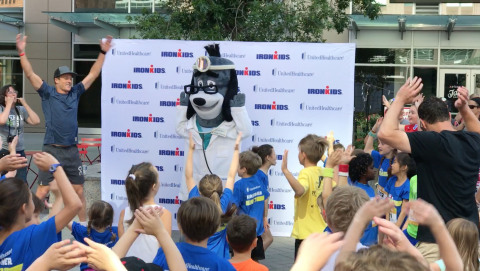 Leon Griffin, an IRONMAN pro-athlete from Australia, and UnitedHealthcare mascot Dr. Health E. Hound led warm-ups prior to today’s UnitedHealthcare IRONKIDS Raleigh Fun Run at Raleigh Marriott City Center. Derek K. Harris Jr. of UnitedHealthcare and state Rep. Duane Hall gave medals to more than 160 kids as they crossed the finish line. (Photo credit: Marc Kawanishi)