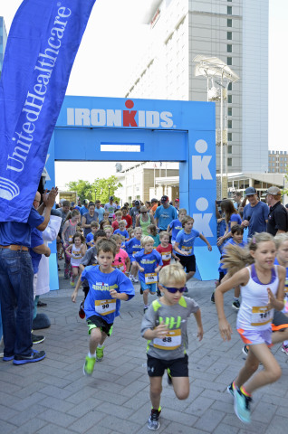 More than 160 kids crossed the finish line at the UnitedHealthcare IRONKIDS Raleigh Fun Run today at Raleigh Marriott City Center. UnitedHealthcare mascot Dr. Health E. Hound helped Derek K. Harris Jr. of UnitedHealthcare and state Rep. Duane Hall kick off the fun run. This is the sixth year UnitedHealthcare is sponsoring IRONKIDS races in the United States. (Photo credit: Marc Kawanishi)