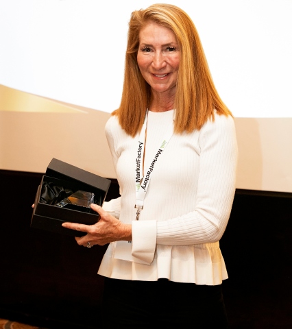 Jane Hamilton, managing director at IHS Markit, accepts the Profit & Loss Readers' Choice Award for Best Post Trade Provider. (Photo: Business Wire)