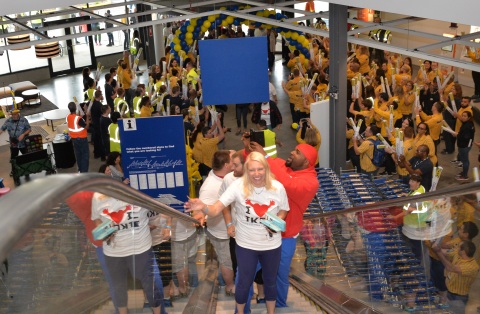 First customers Felicia Andes and Kenneth Heyward are greeted by IKEA Columbus coworkers in celebration of the store’s grand opening this morning. (Photo: Business Wire)