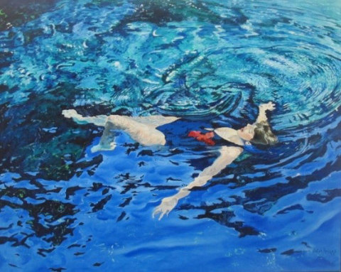 “Swimmer #7,” by John Briggs, depicting a woman floating peacefully on crystal blue water. This is among many works in the Rembrandt/Meek exhibition at the Polk Museum of Art at Florida Southern College. (Photo: Business Wire)