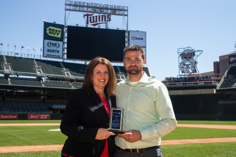 Minnesota Twins -- From left to right: Kelly George, Major Account Manager, Pitney Bowes and Josh Fallin, Office Services Coordinator, Minnesota Twins (Photo: Business Wire)