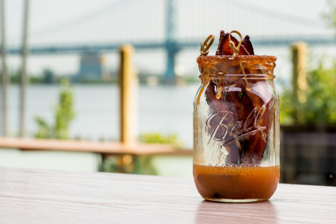 Located on the riverwalk directly behind SugarHouse, Fishtown Hops opens on Thursday, June 22 with free parking and features a menu that includes candied bacon and more. (Photo: Business Wire)