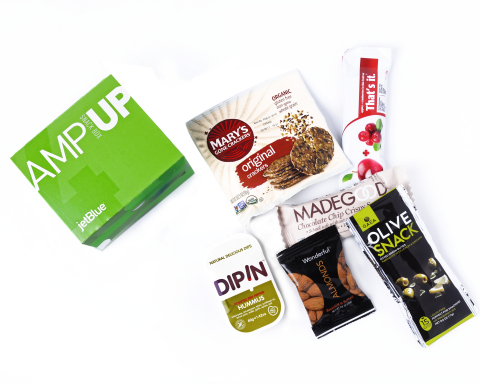 JetBlue's new AmpUp box: These healthful nibbles hit the trifecta of gluten-free, vegan and kosher, offering Mary’s Gone Crackers®, red pepper hummus, a MadeGood® chocolate crispy rice square, Greek olives, roasted almonds and a That’s It® fruit bar. (Photo: Business Wire)
