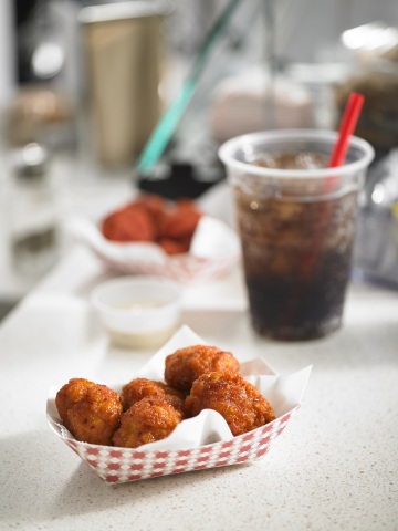 Fully cooked Tyson® Boneless Wings feature bold, on-trend flavors. (Photo: Business Wire)