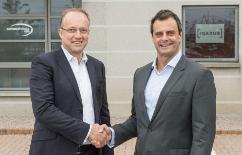 Tim Mitchell, CEO Iqarus and Michael Gardner, Group Director Medical Services at International SOS celebrate the new Joint Venture Partnership, 'Iqarus, In Association with International SOS'. (Photo: Business Wire)