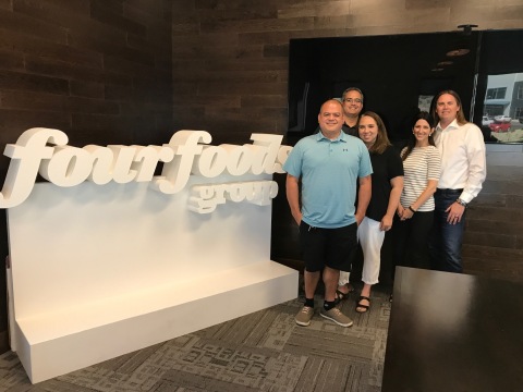 Mo’Bettahs acquired by Four Foods Group. L to R: Kalani Mack, Kimo Mack and Tami Mack from Mo’Bettahs with Shauna Smith and Andrew K. Smith of Four Foods Group. (Photo: Business Wire)