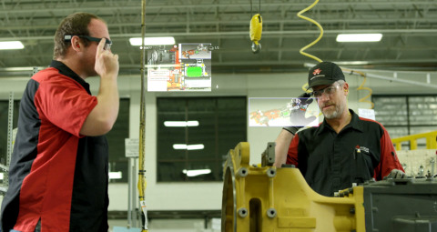 Glass has enabled workers to scan a machine's serial number to instantly bring up a manual, photo, or video they may need to build the tractor. (Photo: Business Wire)