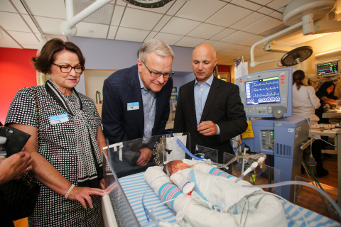 Dr. Philippe Friedlich (right), CHLA's chief of Neonatology, with Teresa and Byron Pollitt, discussing care and treatment of vulnerable infants. (Photo by Children's Hospital Los Angeles)
