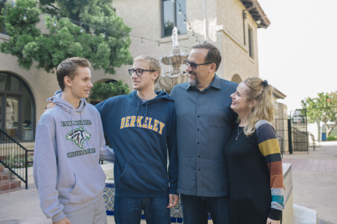 Fairmont Preparatory Academy student Jake Palmer, a junior, (left) with brother Nick Palmer, a Fairmont graduate and sophomore at University of California, Berkeley, with parents Shane and Tracy Palmer, at the Anaheim, Calif. campus. The boys, who have attended since 1st and 5th grade, have found their passion for debate and business at Fairmont Prep. (Photo: Business Wire)