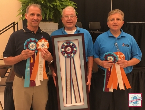 Company Recipients: Joe Santoro, Gary Mantolesky and Richard Bousquet accepting The Chip Festival's Grand Champion Award. (Photo: Business Wire)