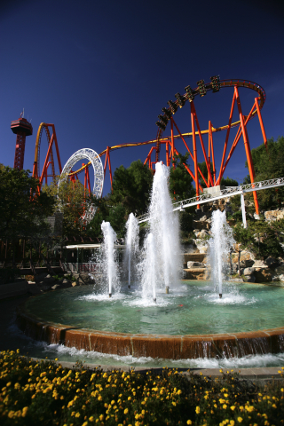 The roller coaster, Tatsu, flies over Valencia Falls at Six Flags Magic Mountain.  The theme park is launching a 365-day operating schedule on January 1, 2018. (Photo: Business Wire)