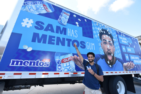 Mentos Gum and Snapchat-star, Sara Hopkins surprised incoming University of Wisconsin freshman Sam Jeschke with a challenge of a lifetime on Wednesday, August 30 in Madison, Wisconsin. Jeschke has until the first day of class (on Wednesday, September 6) to share 43,000 bottles of Mentos Gum enough for the entire student body to earn a free DJ Khaled concert for his classmates and a year of tuition for himself. Follow along at SamHasMentosGum.com. (Photo by Daniel Boczarski/Getty Images for Mentos Gum)