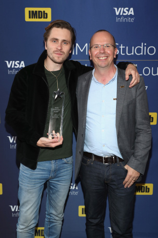 Col Needham (IMDb Founder & CEO) presents Sverrir Gudnason (star of "Borg/McEnroe") with the IMDb "Breakout Star" STARmeter Award In Toronto At The Visa Infinite Lounge. (Photo: Business Wire)