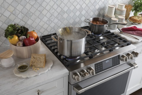 The new gas and dual fuel GE Café™ slide-in ranges come with six burners, an industry-first on a 30-inch range, and a double oven—all in the same space used by most standard upright ranges. (Photo: GE Appliances, a Haier company)