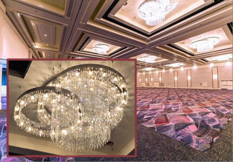 Royal Contract Lighting created twenty-one steel and crystal cluster chandeliers, ranging from eight to ten feet in diameter, for a Flamingo Las Vegas ballroom. (Photo: Business Wire)