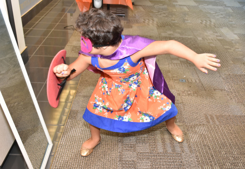 A little superhero enjoys the 8th annual Night of Magic (Photo: Business Wire)