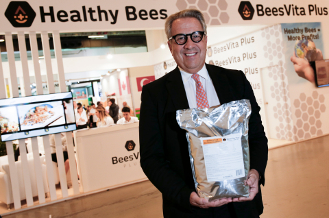 Lee Rosen, Chairman & CEO, Healthy Bees, LLC, at 45th annual Apimondia International Apiculture Congress, Istanbul, Turkey, displaying 5kg package of BeesVita Plus, his company’s scientific breakthrough nutritional formulation for honey bees – billions of which face global annihilation due to unexplained epidemic of colony loss. (Source: Bryan Glazer / World Satellite Television News)