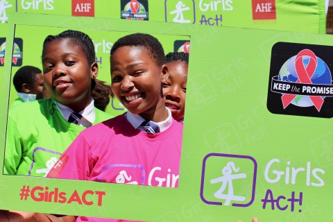 Young girls strike a pose at an AHF Girls ACT event (Photo: Business Wire)