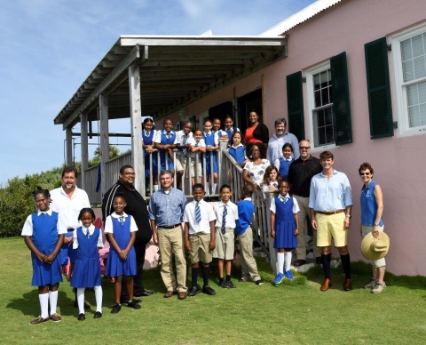Students from the Harrington Sound Primary School visit the Trunk Island Living Classroom during a celebration of RenaissanceRe's donation to the BZS. (Pictured with the students from left to right, front row): Richard Winchell, 2nd Vice President, BZS; Wendell Ebbin, Member, RenaissanceRe Bermuda CSR Committee; Robert Qutub, Chief Financial Officer, RenaissanceRe; Adrian Hartnett-Beasley, Chairman, RenaissanceRe Bermuda CSR Committee; Dr. Jamie Bacon, BZS Education Officer; (second row, from right to left) Fikrte Ming, Teacher at Harrington Sound Primary School; Dr. Ian Walker, Principal Curator, BZS; Colin Brown, President, BZS; and (back row) Leah Dean, SVP, Human Resources and Head of Corporate Social Responsibility, RenaissanceRe. (Photo: Business Wire)