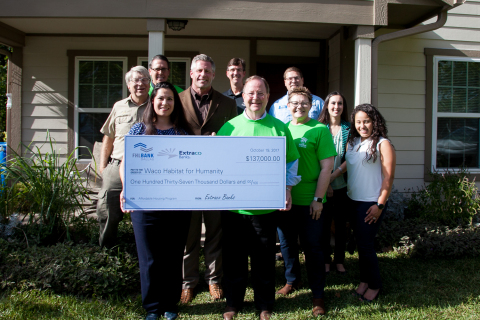 U.S. Representative Bill Flores (R-Texas) joined representatives from the Waco Habitat for Humanity, the Federal Home Loan Bank of Dallas and Extraco Banks today to put in sweat equity at a Habitat for Humanity home under construction in Waco, Texas, and celebrate $137,000 in Affordable Housing Program grant funds from the banks. (Photo: Business Wire)