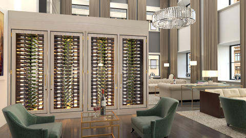This custom refrigerated wine cabinet was handcrafted for the Ritz-Carlton, Chicago from white ash and features dual glass doors to easily access the wine from both sides of the cabinet. (Photo: Business Wire)