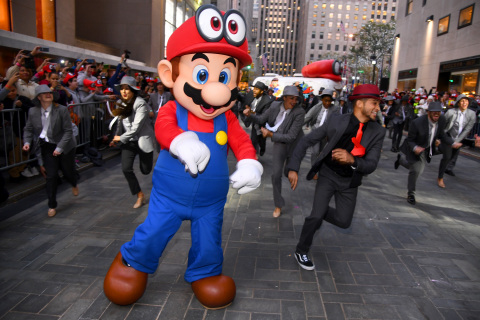 Mario and Jordan Fisher, actor, recording artist and current contestant on Dancing with the Stars, co-host the Super Mario Odyssey for Nintendo Switch launch event on October 26, 2017 at Rockefeller Plaza in New York City. (Photo by Dave Kotinsky/Getty Images for Nintendo of America)