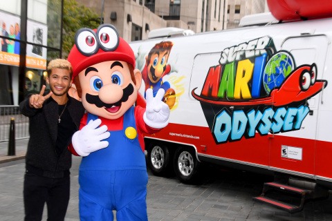 Jordan Fisher, multi-talented star and current contestant on Dancing with the Stars, and Mario co-host the Super Mario Odyssey for Nintendo Switch launch event on October 26, 2017 at Rockefeller Plaza in New York. (Photo by Dave Kotinsky/Getty Images for Nintendo of America)