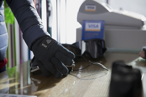 Visa, the exclusive payment technology partner of the Olympic and Paralympic Games, today introduced three commercially available wearable payment devices: NFC-enabled payment gloves, commemorative stickers and Olympic pins. Pictured here: the Visa payment-enabled gloves. (Photo: Business Wire)