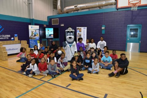 UnitedHealthcare donated 150 NERF Energy Game Kits to the Boys & Girls Clubs of Greater Charlotte as part of a national initiative to encourage young people to become more active through "exergaming." Martha Browne of UnitedHealthcare helped mascot Dr. Health E. Hound demonstrate the NERF ENERGY Rush app to Club members. The donation is part of a recently launched national initiative between Hasbro and UnitedHealthcare, featuring Hasbro's NERF products, that encourages young people to become more active through "exergaming" (Photo: Pam Brackett).