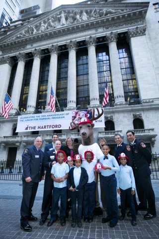 The Hartford commemorates the 70th anniversary of its Junior Fire Marshal program by ringing The Closing Bell at the New York Stock Exchange. (Photo: Business Wire)