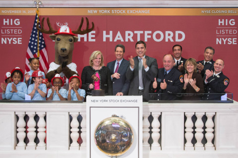 The Hartford’s Chairman and CEO Christopher Swift rang The Closing Bell® at the New York Stock Exchange (NYSE) on Nov. 16. Joining Swift from The Hartford was Chief Financial Officer Beth Bombara and Chief Marketing and Communications Officer Kathy Bromage. In addition, FDNY Lieutenants Michael Kozo, John Errico, and Steven Vano, Firefighter Frank Vanderlofske and six students in kindergarten through third grade from P.S. 63 in the Bronx also joined Swift on the platform to raise awareness of the importance of fire safety. (Photo: Business Wire)