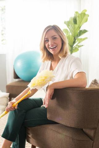 Adulting can be hard, but Swiffer makes it easy! Actress and comedian Abby Elliott relaxes on set while filming the Art of Adulting with Swiffer video series in Los Angeles in November. (Photo by Roman Cho/Invision for Swiffer/AP Images)