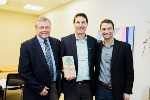 Staples accepting a Forest Stewardship Council Leadership Award at Knoll Showroom in Boston on November 8, 2017. From left to right: Mark Buckley, VP sustainability, Staples, Corey Brinkema, US president, FSC, Jake Swenson, director sustainability, Staples Photo credit: Ebersole Photography