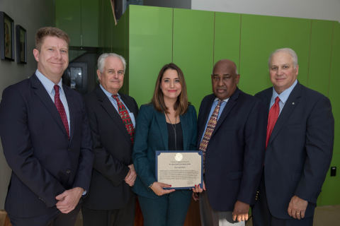 Booker T. Morris III (2nd from right), district counsel for Congresswoman Sheila Jackson Lee’s office, presented Texas Capital and FHLB Dallas with a certificate of Congressional Recognition for their support of small business recovery efforts. Texas Capital Bank staff, pictured left to right, are JP Prinz, SBA Development Officer; Roger Russell, EVP; Jenny Guzman, AVP, Community Development; Mr. Morris; and Bill Wilson, chairman, Houston Region. (Photo: Business Wire)