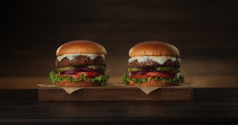 The Beyond Meat Burger, shown here with the Really Good Cheeseburger, looks and satisfies just like a traditional beef burger. Both available now on the menu at more than 450 TGI Fridays locations nationwide. (Photo: Business Wire)
