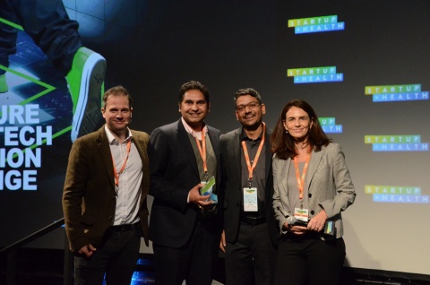 Pictured are Jvion executives accepting the designation of Top Innovator by John Pugh of Accenture at the 2018 Accenture HealthTech Innovation Challenge (Photo: Business Wire)