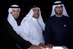 HE Dr. Mohammed Ateeq Al Falahi - Secretary General, Emirates Red Crescent, HE Ahmed Al Sayegh - Chairman Abu Dhabi Global Market and HE Dr. Sultan Al Jaber - Minister of State and Director-General of the Zayed Future Energy Prize light up the installation. (Photo: AETOSWire)